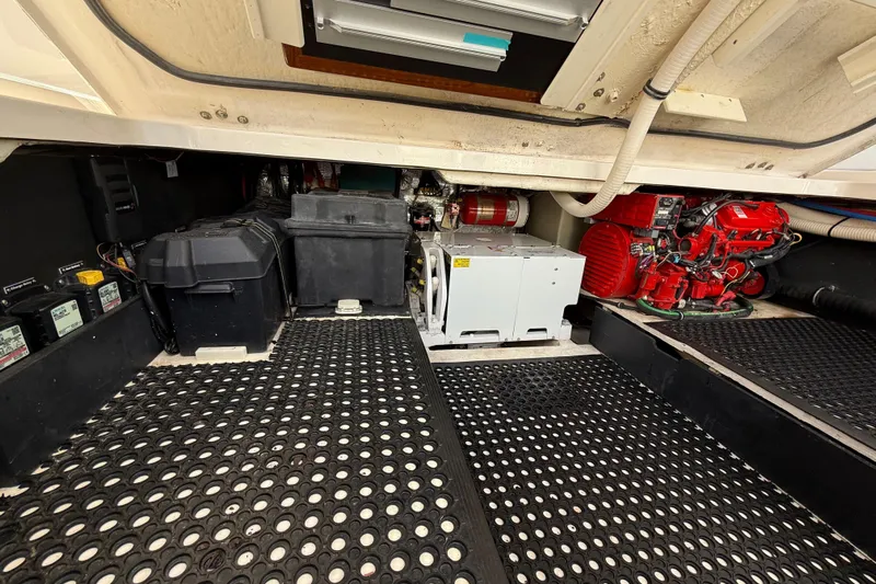  Yacht Photos Pics Engine compartment of 2020 Regal 38 SAV boat with visible machinery and equipment.