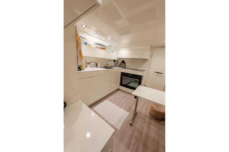 Mr K Yacht Photos Pics Luxurious kitchen interior of 2007 Cerri Cantieri Navali 86 Flying Sport yacht.
