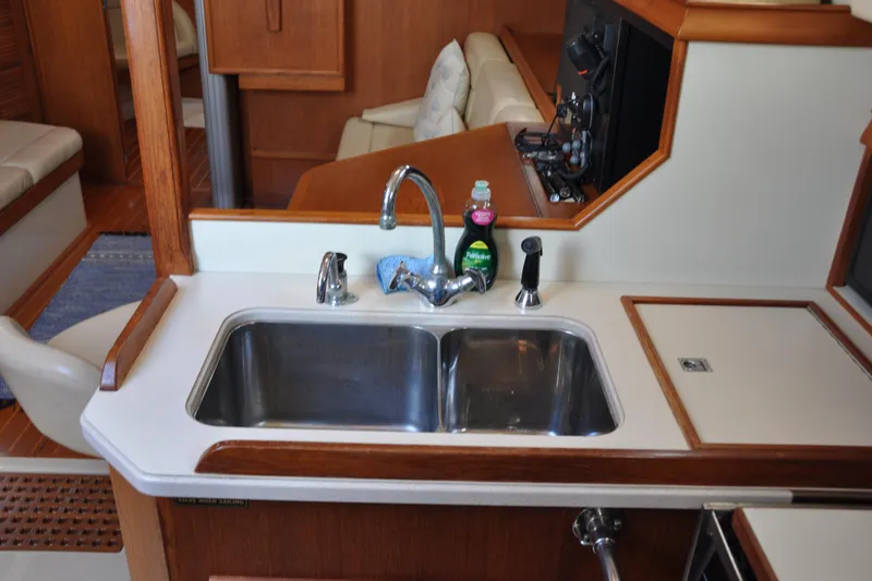 Resolute Yacht Photos Pics Galley sink area in 2002 Island Packet 420 yacht interior.