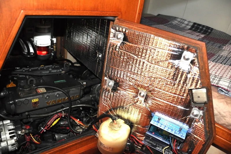 Resolute Yacht Photos Pics Engine compartment of a 2002 Island Packet 420 sailboat with Yanmar engine.