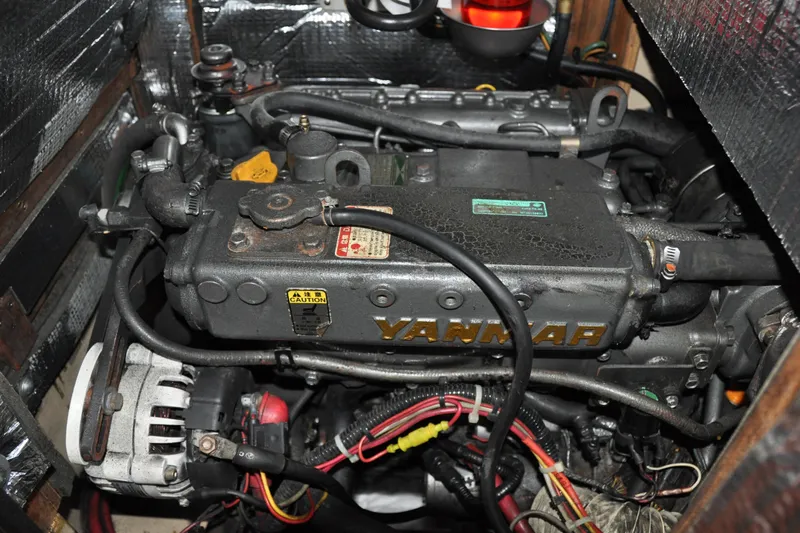 Resolute Yacht Photos Pics Engine compartment of a 2002 Island Packet 420 sailboat, featuring a Yanmar engine.