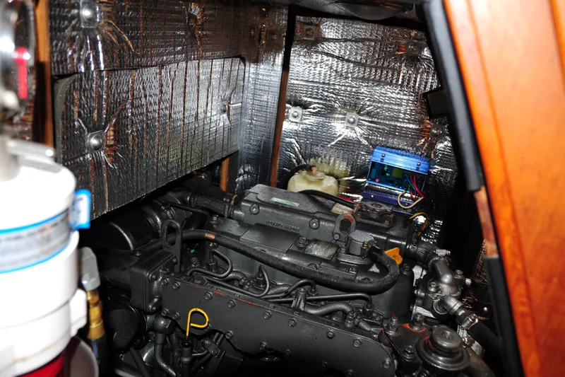 Resolute Yacht Photos Pics Engine compartment of a 2002 Island Packet 420 sailboat with insulation and components.