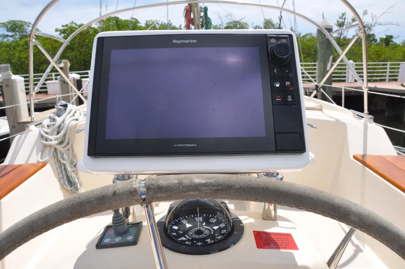 Resolute Yacht Photos Pics Steering console of 2002 Island Packet 420 sailboat with Raymarine navigation display.