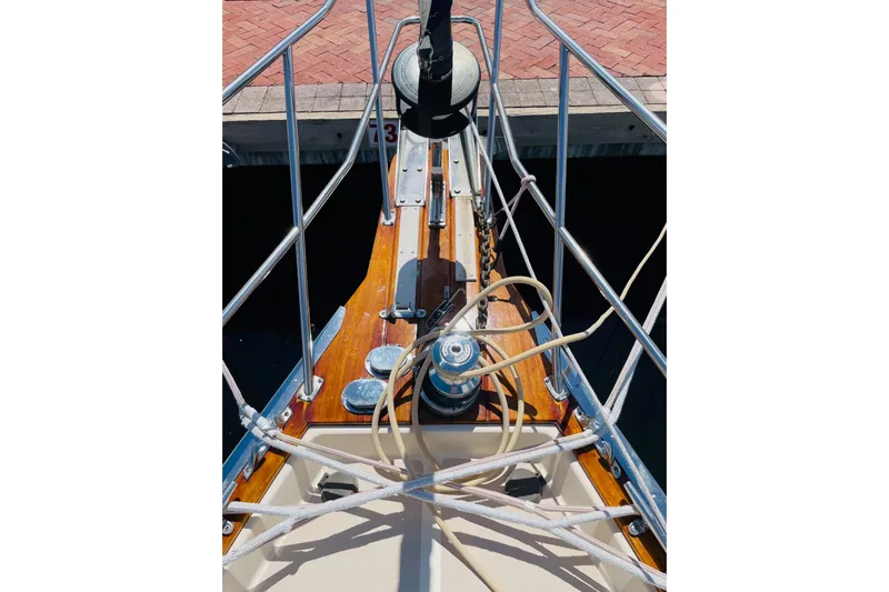 Resolute Yacht Photos Pics Bow of 2002 Island Packet 420 sailboat with ropes and winch at dock.