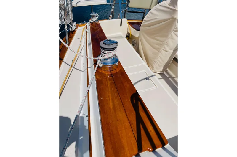 Resolute Yacht Photos Pics Polished deck of 2002 Island Packet 420 sailboat with winch and ropes.