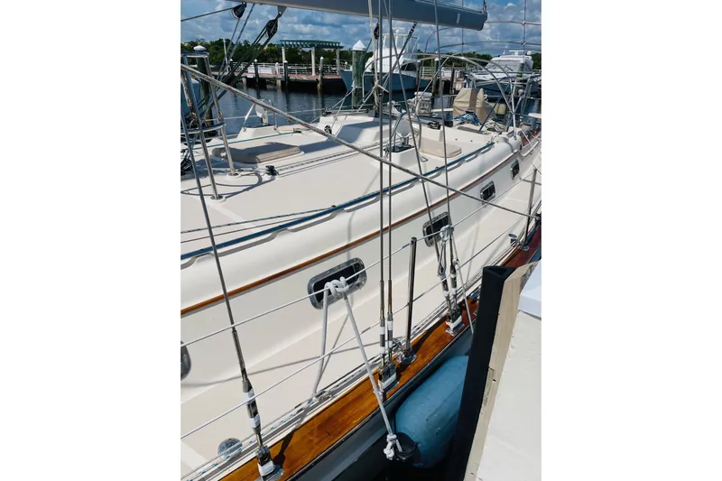 Resolute Yacht Photos Pics 2002 Island Packet 420 sailboat docked, showcasing deck and rigging details.