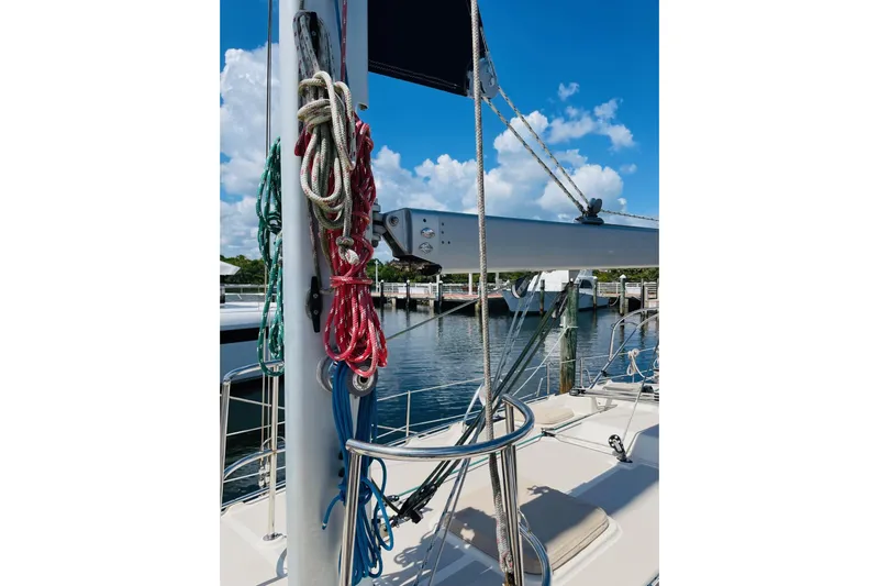 Resolute Yacht Photos Pics Sailboat rigging on 2002 Island Packet 420, docked under a clear blue sky.