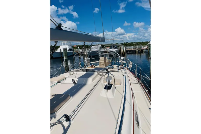 Resolute Yacht Photos Pics 2002 Island Packet 420 sailboat docked under a clear blue sky.