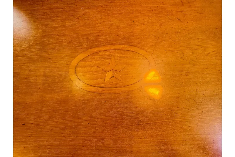 Resolute Yacht Photos Pics Wooden surface with star emblem, Island Packet 420, 2002 model.