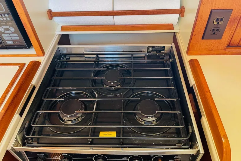 Resolute Yacht Photos Pics Three-burner stove in 2002 Island Packet 420 yacht kitchen.