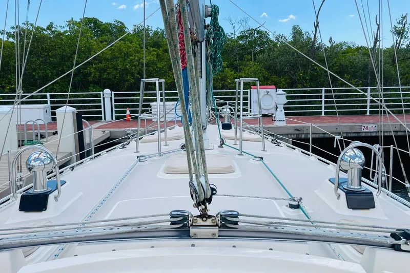 Resolute Yacht Photos Pics Deck view of a 2002 Island Packet 420 sailboat docked at a marina.