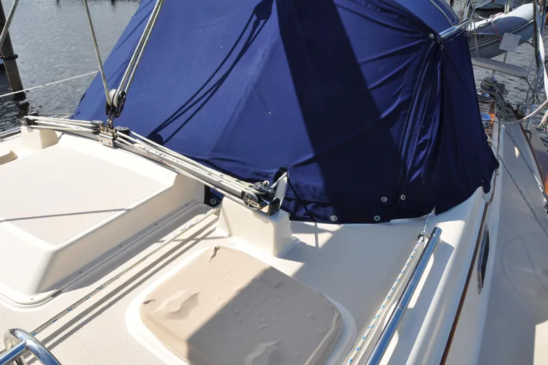 Resolute Yacht Photos Pics 2002 Island Packet 420 sailboat deck with blue canvas cover and rigging.