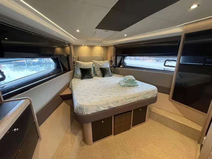  Yacht Photos Pics Luxurious bedroom interior of 2018 Azimut Atlantis 51 yacht with modern design.