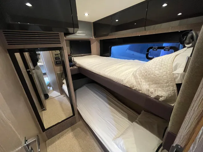  Yacht Photos Pics Interior cabin of 2018 Azimut Atlantis 51 yacht with bunk beds and modern design.