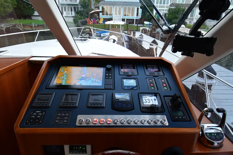 Promesa Yacht Photos Pics Helm of 2021 Hylas M44 yacht with navigation controls and display.