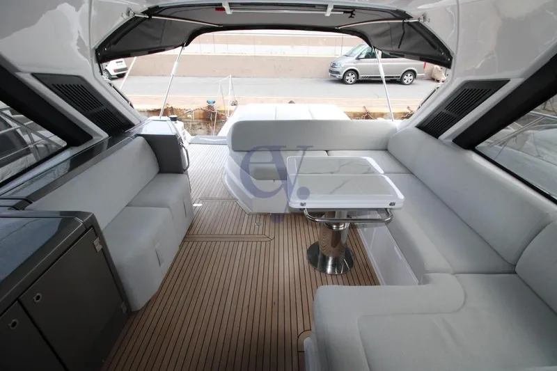  Yacht Photos Pics Luxurious interior of 2022 Azimut Atlantis 51 yacht with sleek seating and modern design.