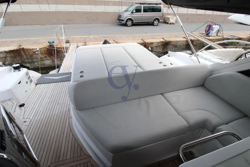  Yacht Photos Pics Luxurious 2022 Azimut Atlantis 51 yacht with spacious deck and comfortable seating.