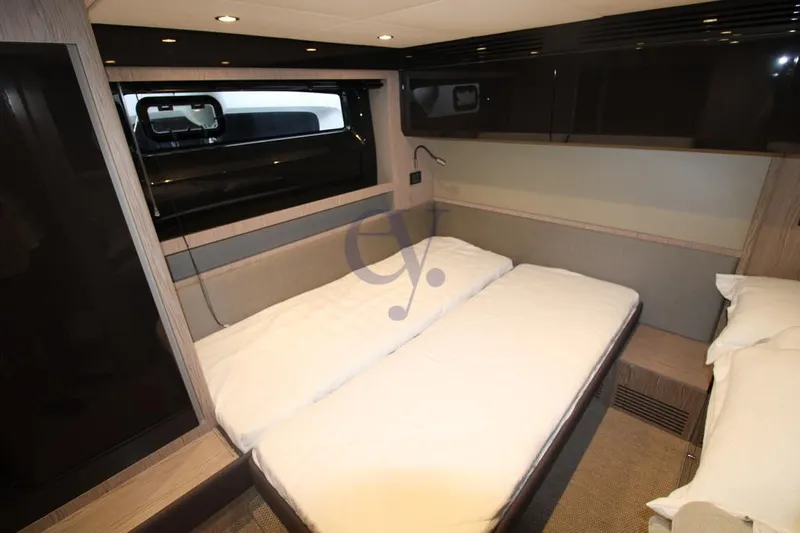  Yacht Photos Pics Luxurious cabin interior of 2022 Azimut Atlantis 51 yacht with modern design.