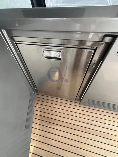  Yacht Photos Pics Stainless steel appliance on Azimut Atlantis 51 yacht, 2022 model, with teak flooring.