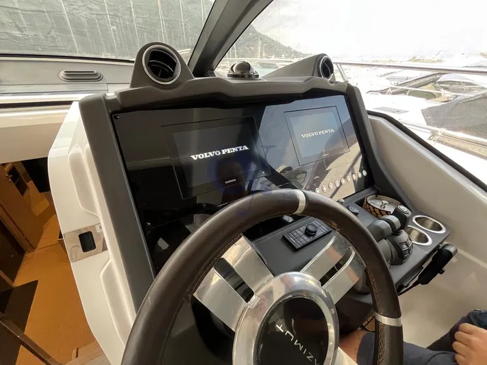  Yacht Photos Pics Helm of 2022 Azimut Atlantis 51 yacht with Volvo Penta displays and controls.