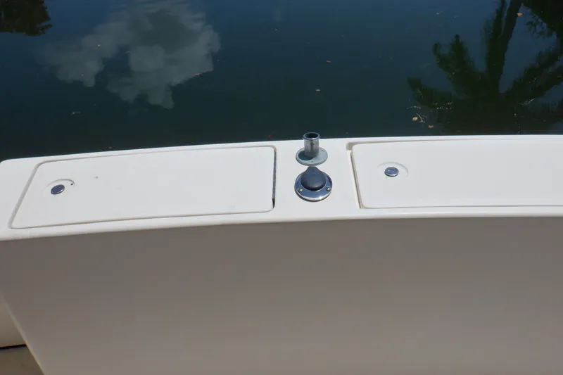 Betty Sue Yacht Photos Pics 2006 Mainship 34 Trawler deck detail with water reflection.