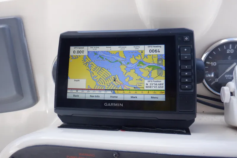 Betty Sue Yacht Photos Pics Garmin GPS display on 2006 Mainship 34 Trawler, showing navigation map and coordinates.
