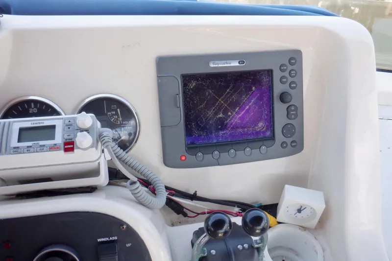 Betty Sue Yacht Photos Pics Control panel of a 2006 Mainship 34 Trawler with navigation equipment.