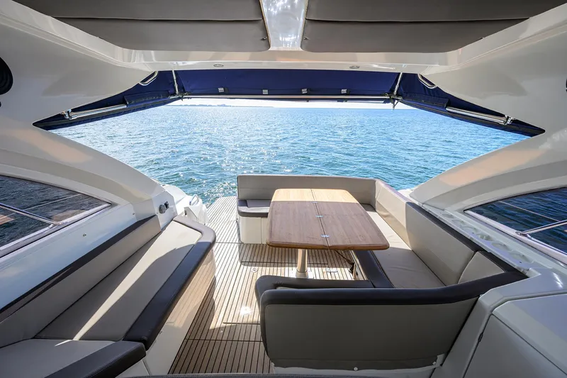  Yacht Photos Pics Luxurious 2015 Beneteau 38 GT yacht interior with ocean view and seating area.