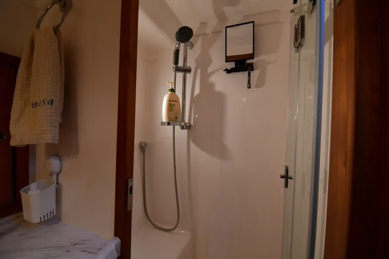Promesa Yacht Photos Pics Shower area in 2021 Hylas M44 yacht with towel and toiletries.