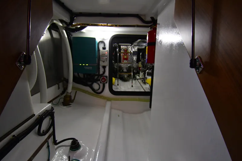 Promesa Yacht Photos Pics Engine room of 2021 Hylas M44 yacht, featuring equipment and wiring.