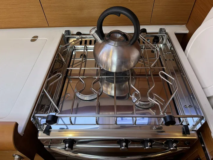 Levity Yacht Photos Pics Stainless steel kettle on stove in 2019 Jeanneau Sun Odyssey 479 yacht kitchen.