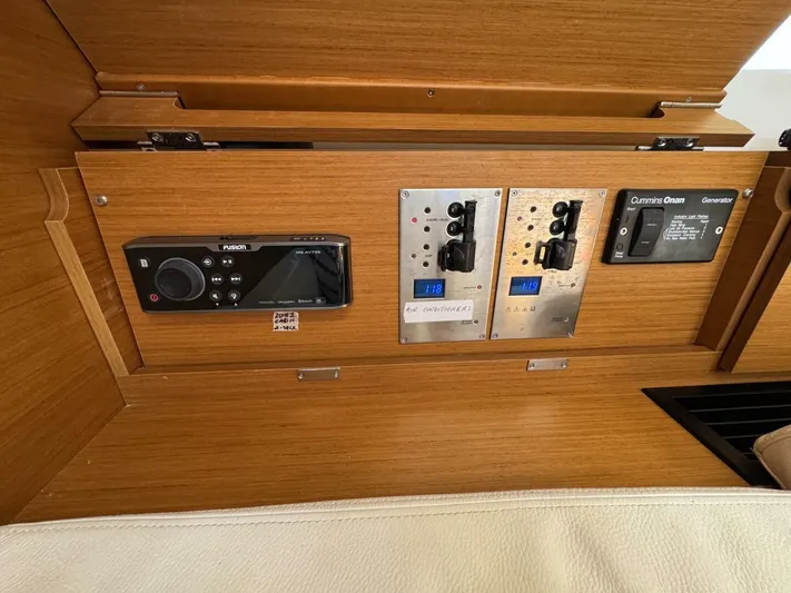 Levity Yacht Photos Pics Control panel of 2019 Jeanneau Sun Odyssey 479 yacht with navigation and electrical systems.