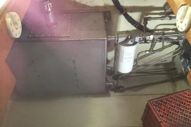 Horus Yacht Photos Pics Engine room of 2013 Custom Trawler 45 with fuel tank and filter system.