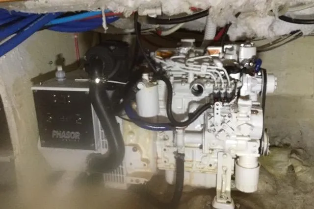 Horus Yacht Photos Pics Engine room of 2013 Custom Trawler 45 with Phasor generator and wiring.