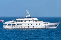 Vintage 1966 Custom GLOBAL ENGINEERING yacht sailing on open sea.