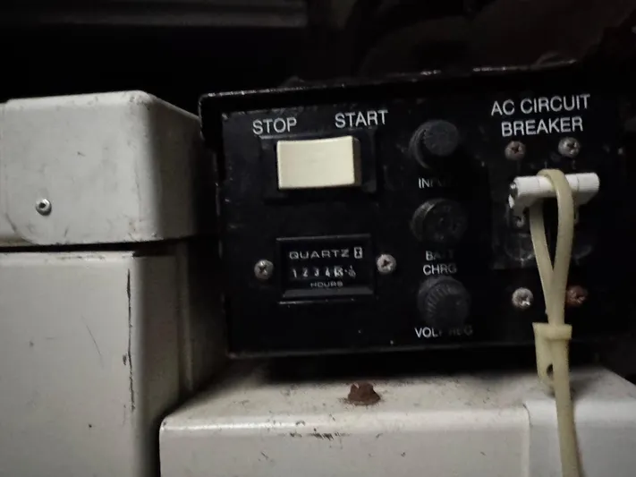  Yacht Photos Pics Control panel on a 2004 Carver 360 Mariner boat with start, stop, and circuit breaker.