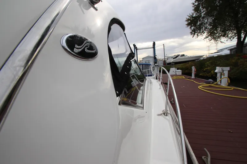  Yacht Photos Pics 2007 Sea Ray 44 Sundancer yacht docked, showcasing sleek design and polished exterior.