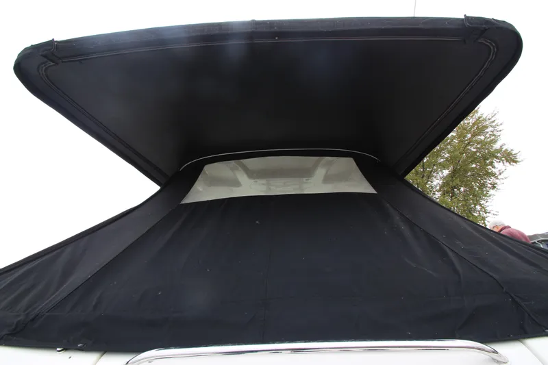  Yacht Photos Pics 2007 Sea Ray 44 Sundancer with black canvas cover, rear view.