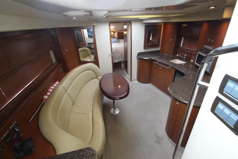  Yacht Photos Pics 2007 Sea Ray 44 Sundancer interior with elegant seating, kitchen, and modern amenities.