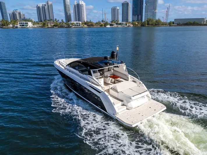  Yacht Photos Pics 2020 Azimut Atlantis 45 yacht cruising in a city waterfront setting.