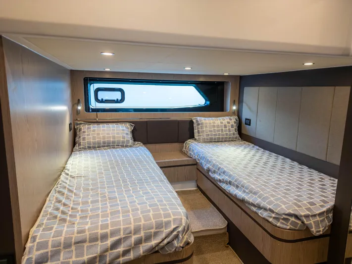  Yacht Photos Pics Luxurious cabin interior of 2020 Azimut Atlantis 45 yacht with twin beds.