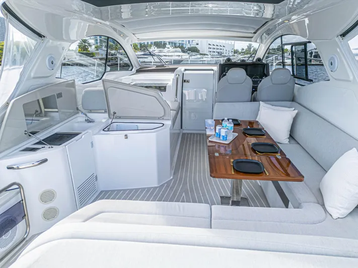  Yacht Photos Pics Luxurious interior of 2020 Azimut Atlantis 45 yacht with seating and dining area.