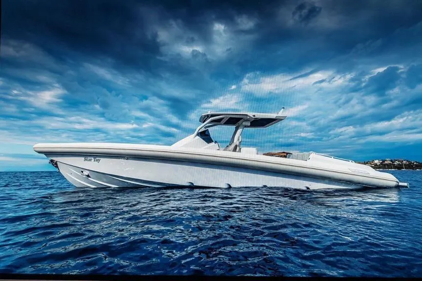 2022 Skipper NC 42 boat on open water under dramatic cloudy sky.