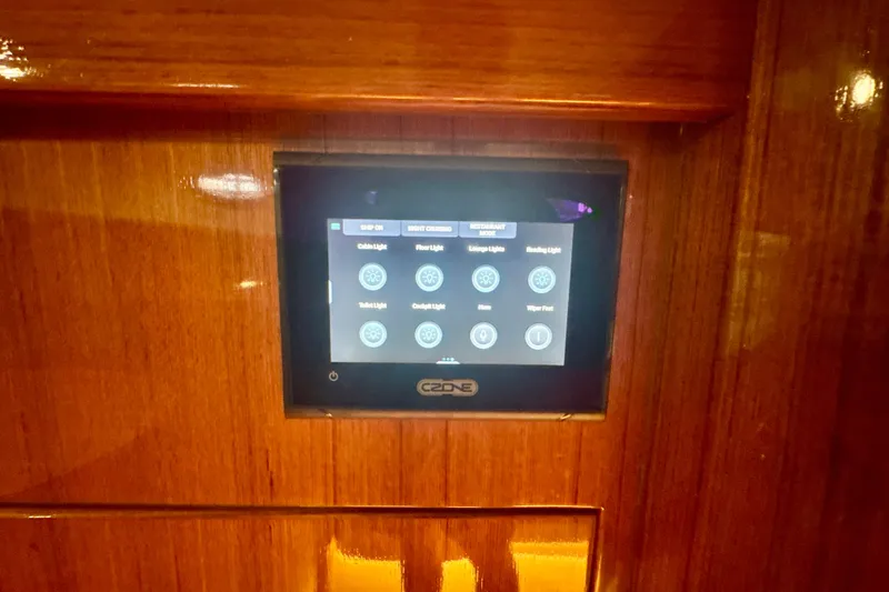 Yacht Photos Pics Touchscreen control panel on 2024 DaVinci 30HT yacht, displaying lighting and system options.