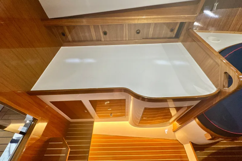  Yacht Photos Pics Luxurious interior of 2024 DaVinci 30HT yacht with elegant wood finish and modern design.
