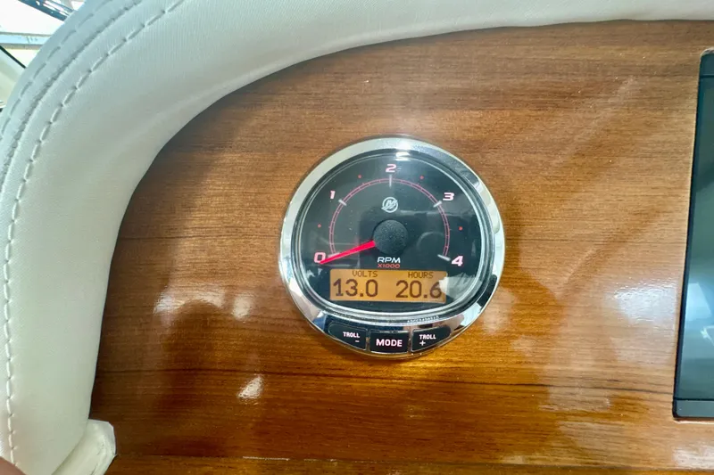  Yacht Photos Pics Tachometer on 2024 DaVinci 30HT boat dashboard, displaying RPM, volts, and hours.