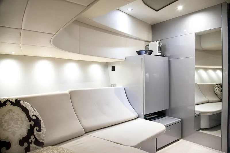 Double K Yacht Photos Pics Luxurious interior of 2010 CNM Continental Tender 50 yacht with modern seating and lighting.