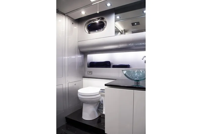 Double K Yacht Photos Pics Luxurious yacht bathroom with modern fixtures, glass sink, and sleek design, CNM Continental Tender 50, 2010.