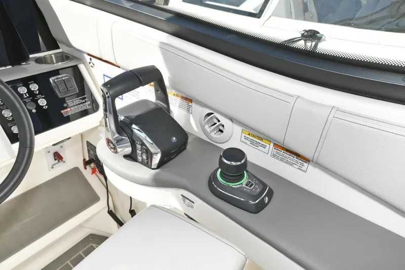  Yacht Photos Pics 2022 Sea Ray Sundancer 320 helm with joystick control and throttle, featuring modern design.