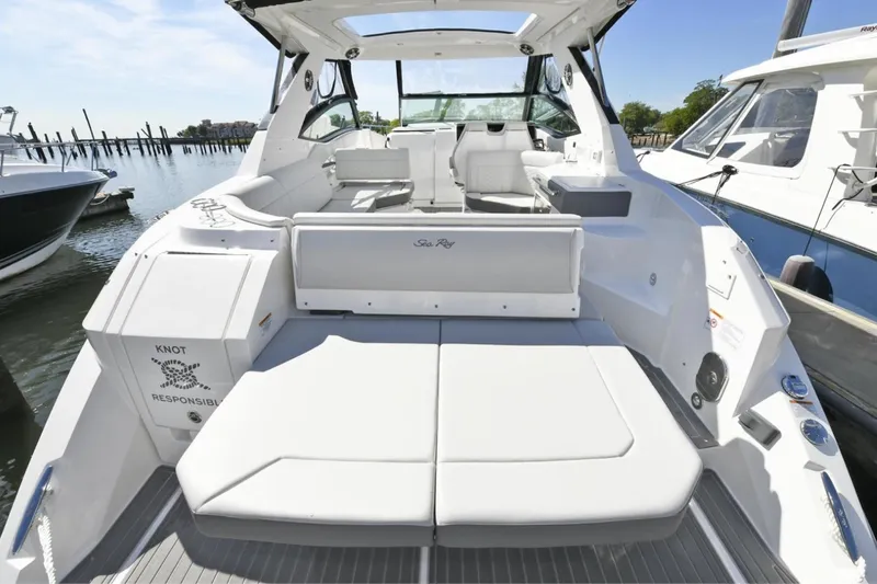  Yacht Photos Pics 2022 Sea Ray Sundancer 320 yacht with spacious deck and luxurious seating.